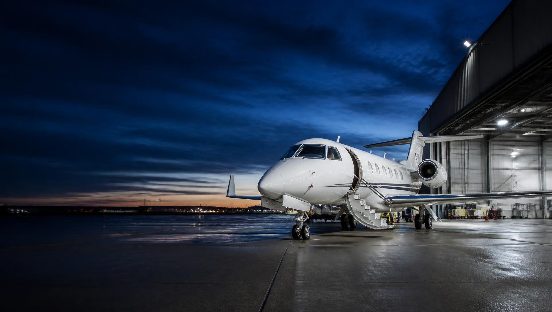 Business aircraft at a professional maintenance hangar